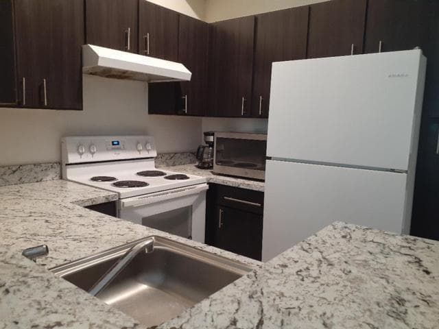 911 Lyons Road 2-207, Coconut Creek, FL 33063 — photo 2 of 15
