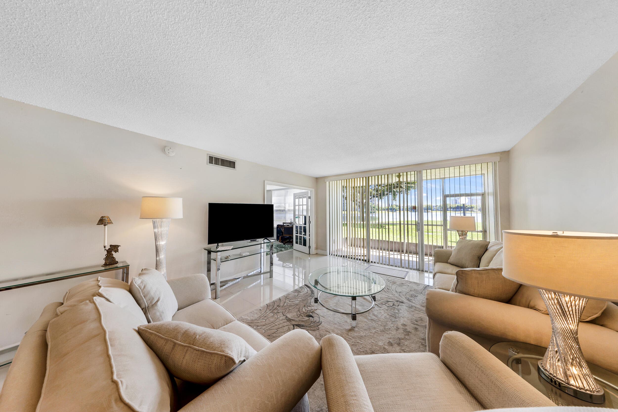 3091 N Course Drive 102, Pompano Beach, FL 33069 — photo 1 of 17