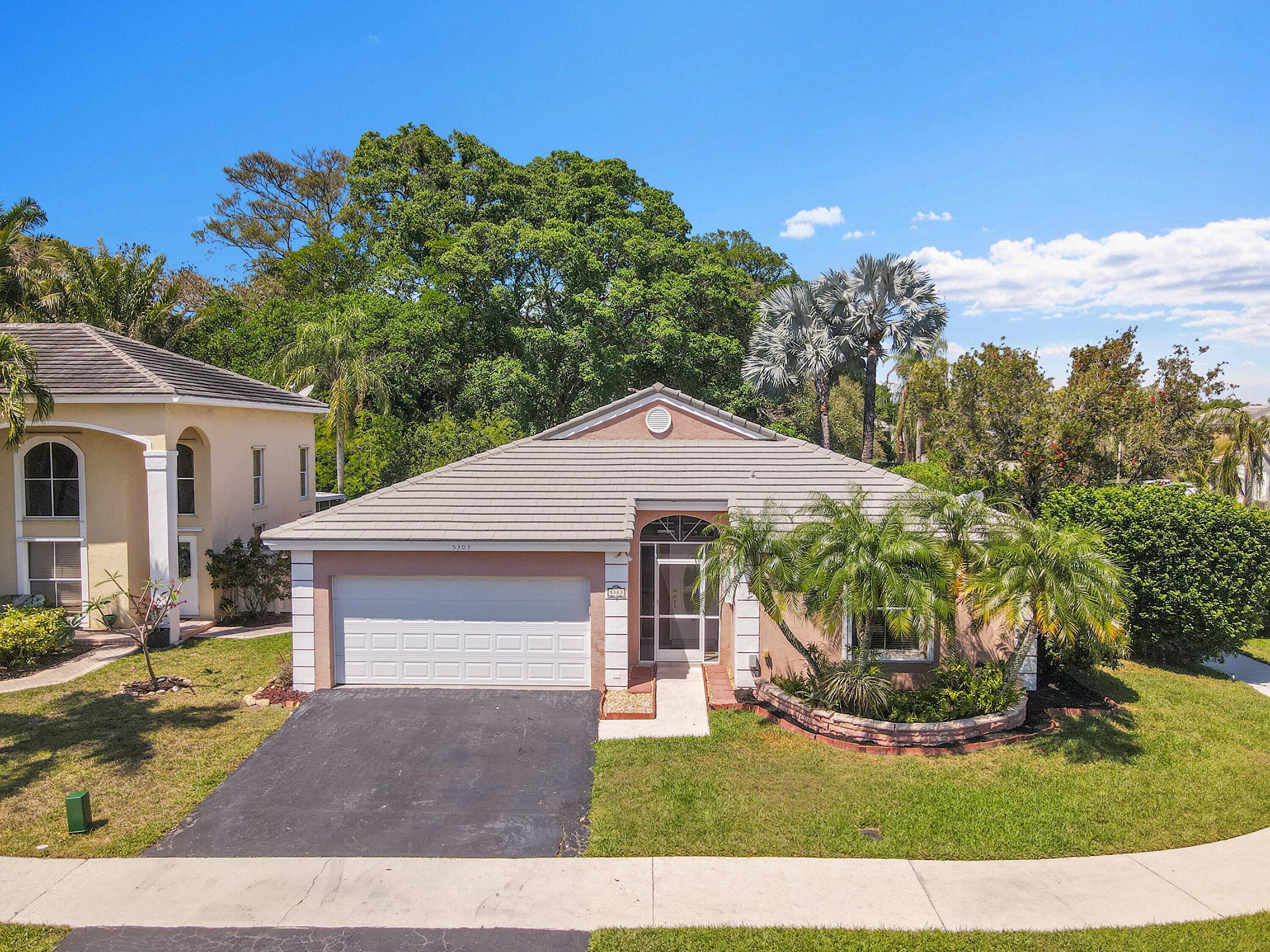 5303 NW 53rd Street, Coconut Creek, FL 33073 — photo 1 of 46