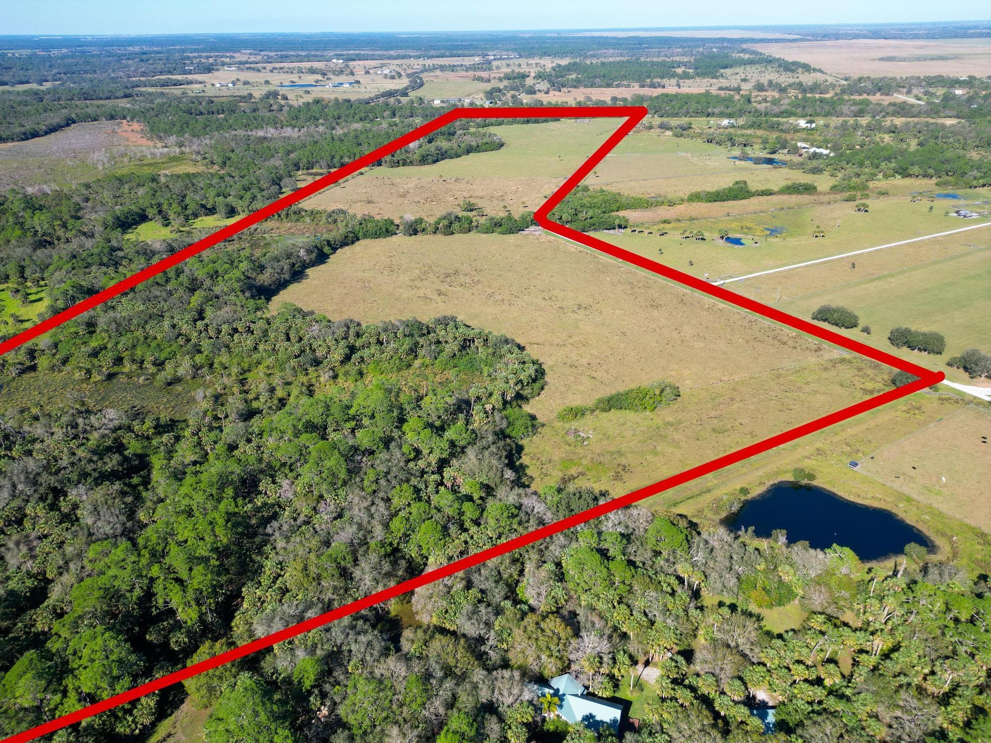 3702 SW Wild Turkey Lane, Okeechobee, FL 34974 — photo 1 of 24