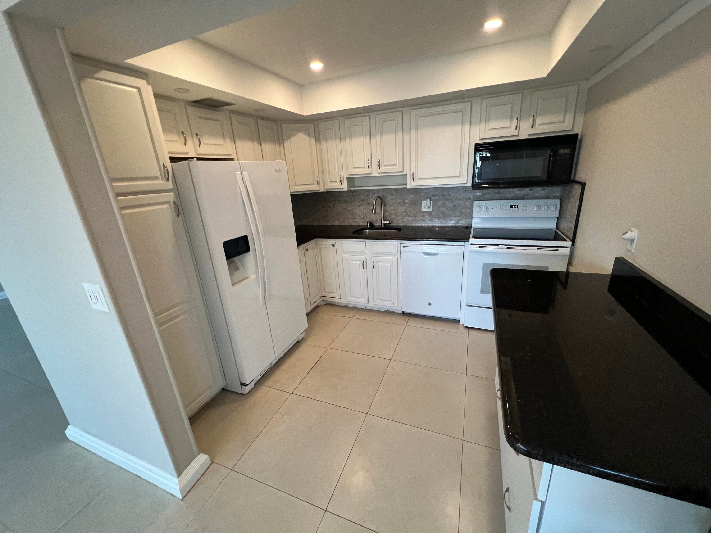 413 Greenbrier A, West Palm Beach, FL 33417 — photo 1 of 39