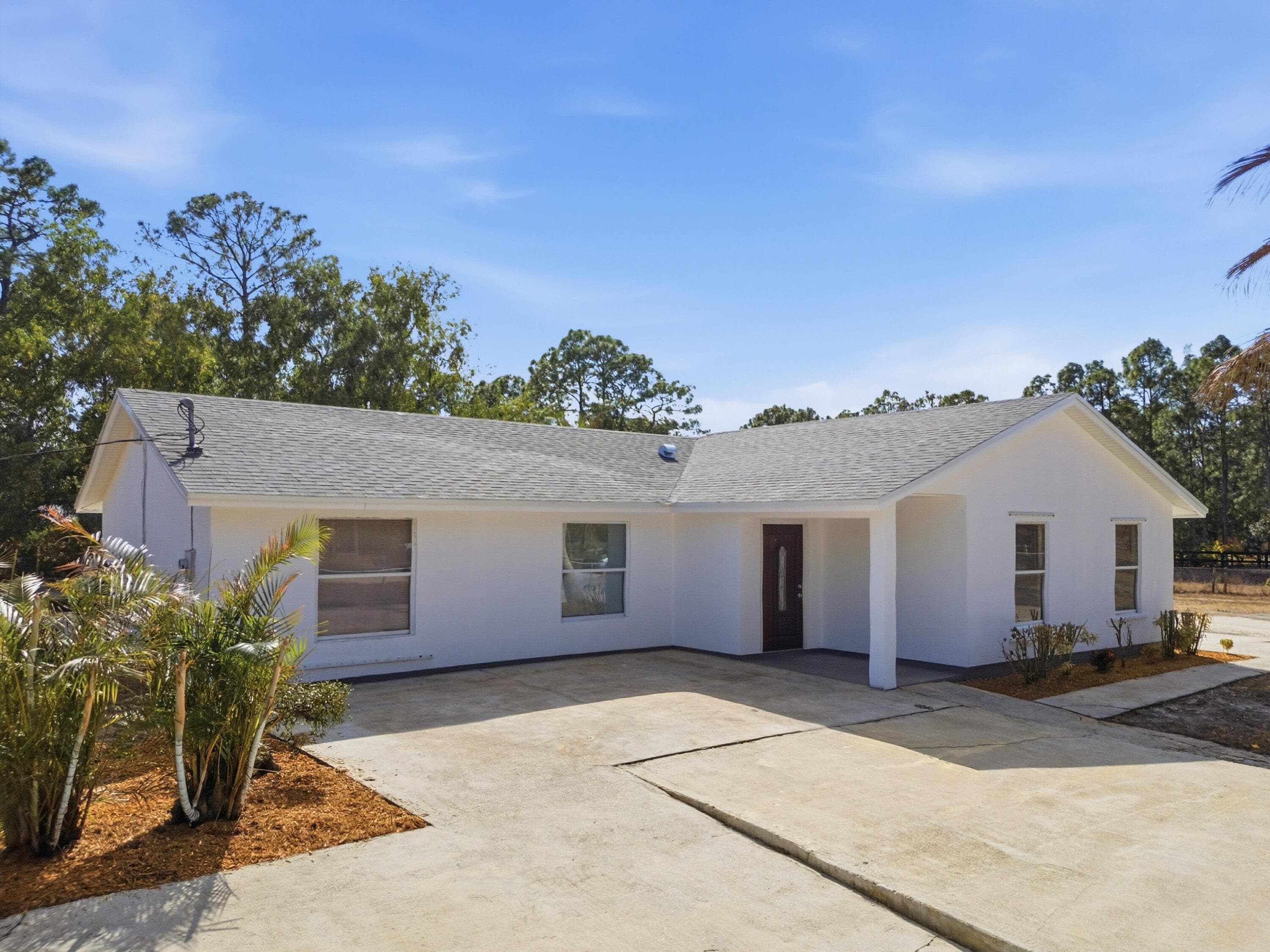 14242 77th Place N, The Acreage, FL 33470 — photo 1 of 38