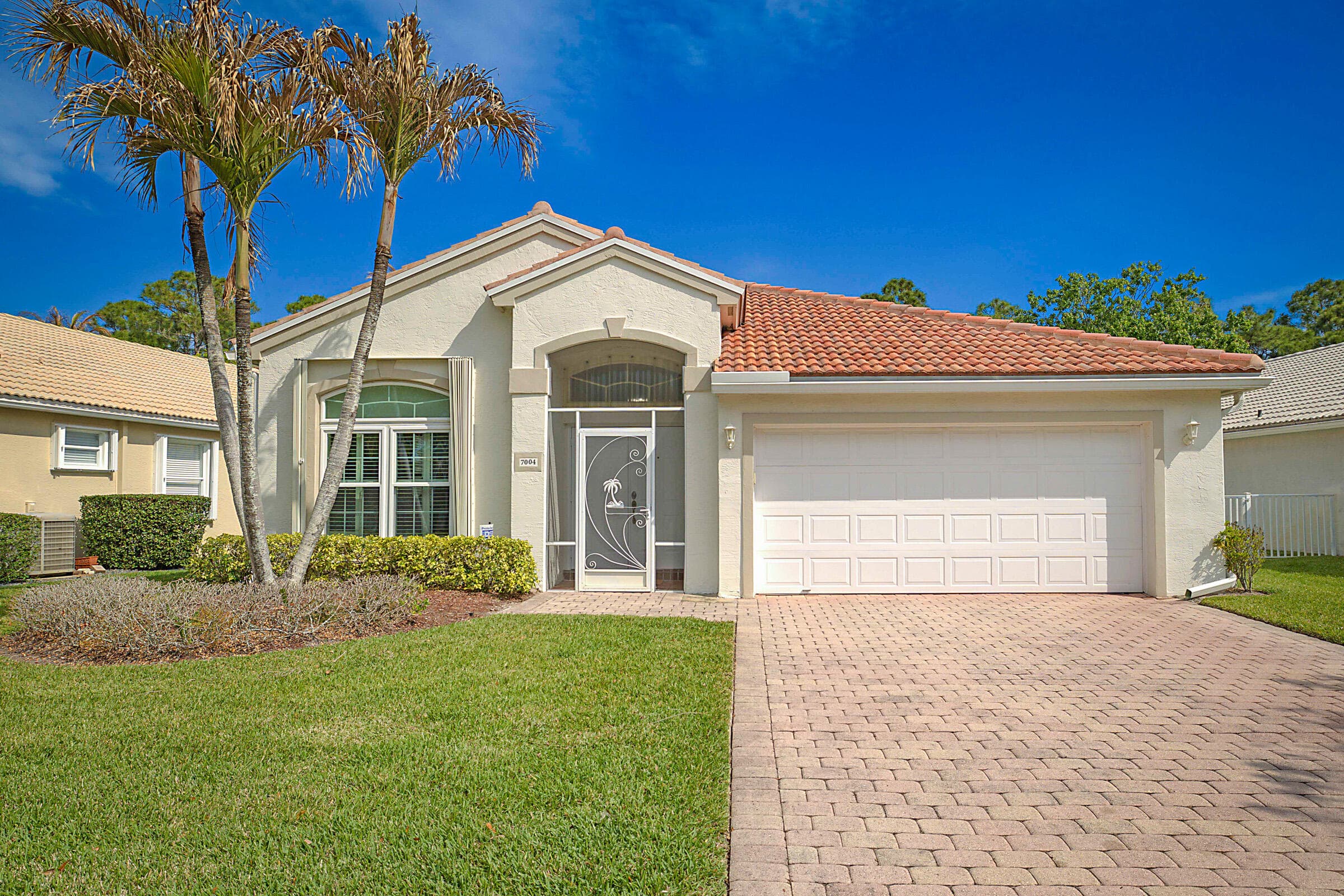7004 SE Twin Oaks Circle, Stuart, FL 34997 — photo 1 of 38