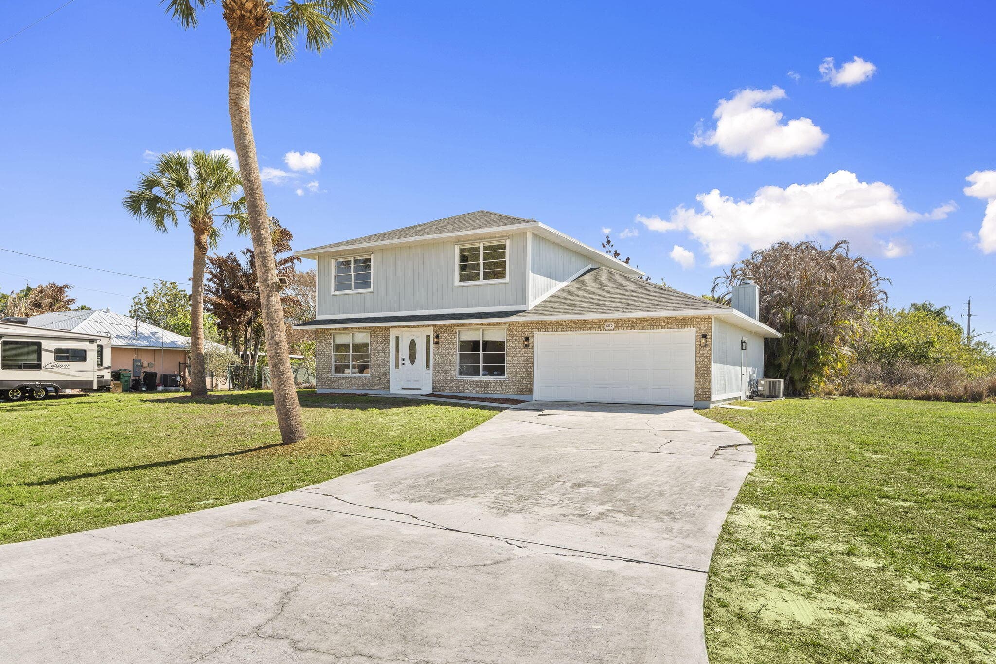 405 NE Midvale Street, Port St. Lucie, FL 34983 — photo 1 of 60