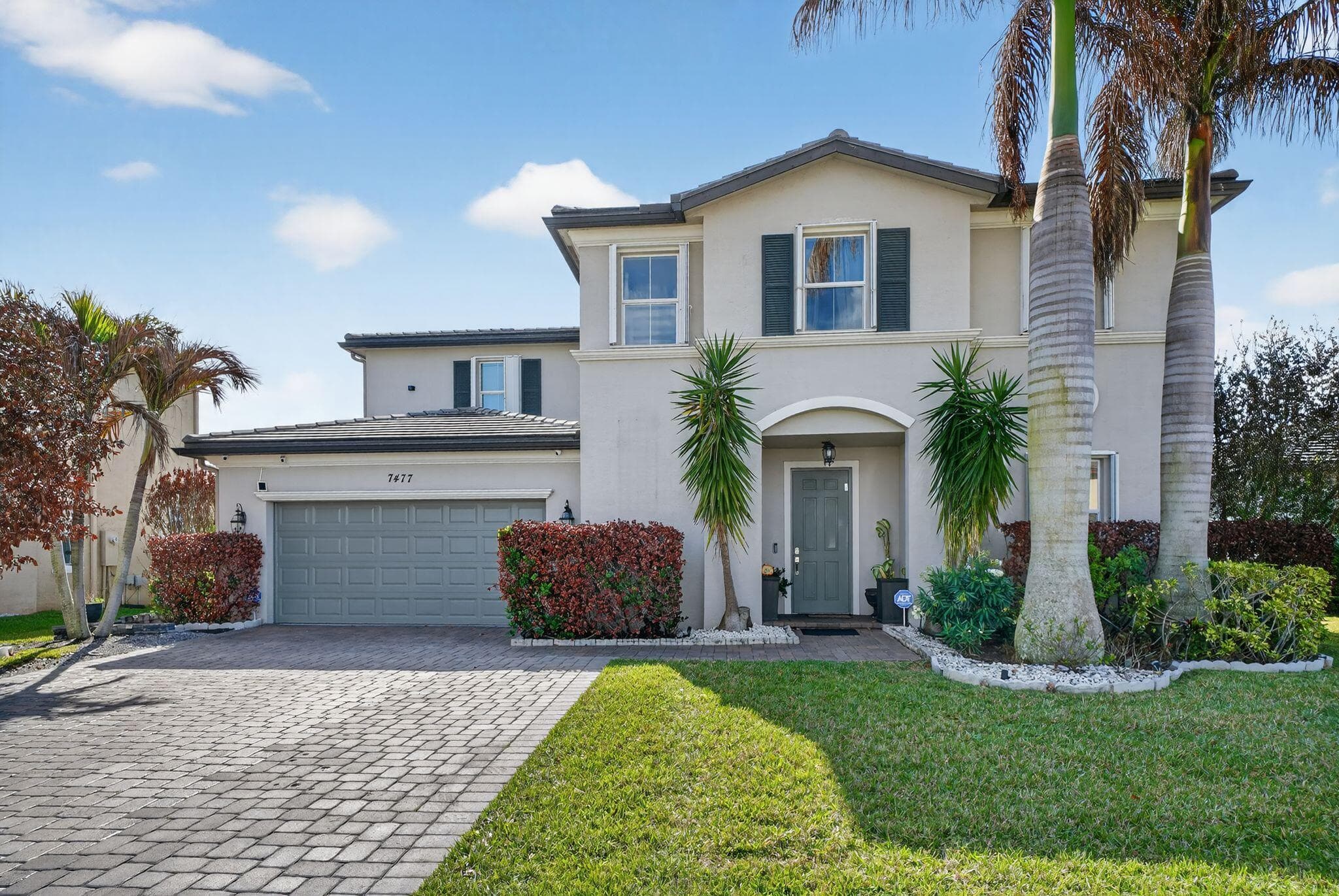 7477 NW Greenspring Street, Port St. Lucie, FL 34987 — photo 1 of 31