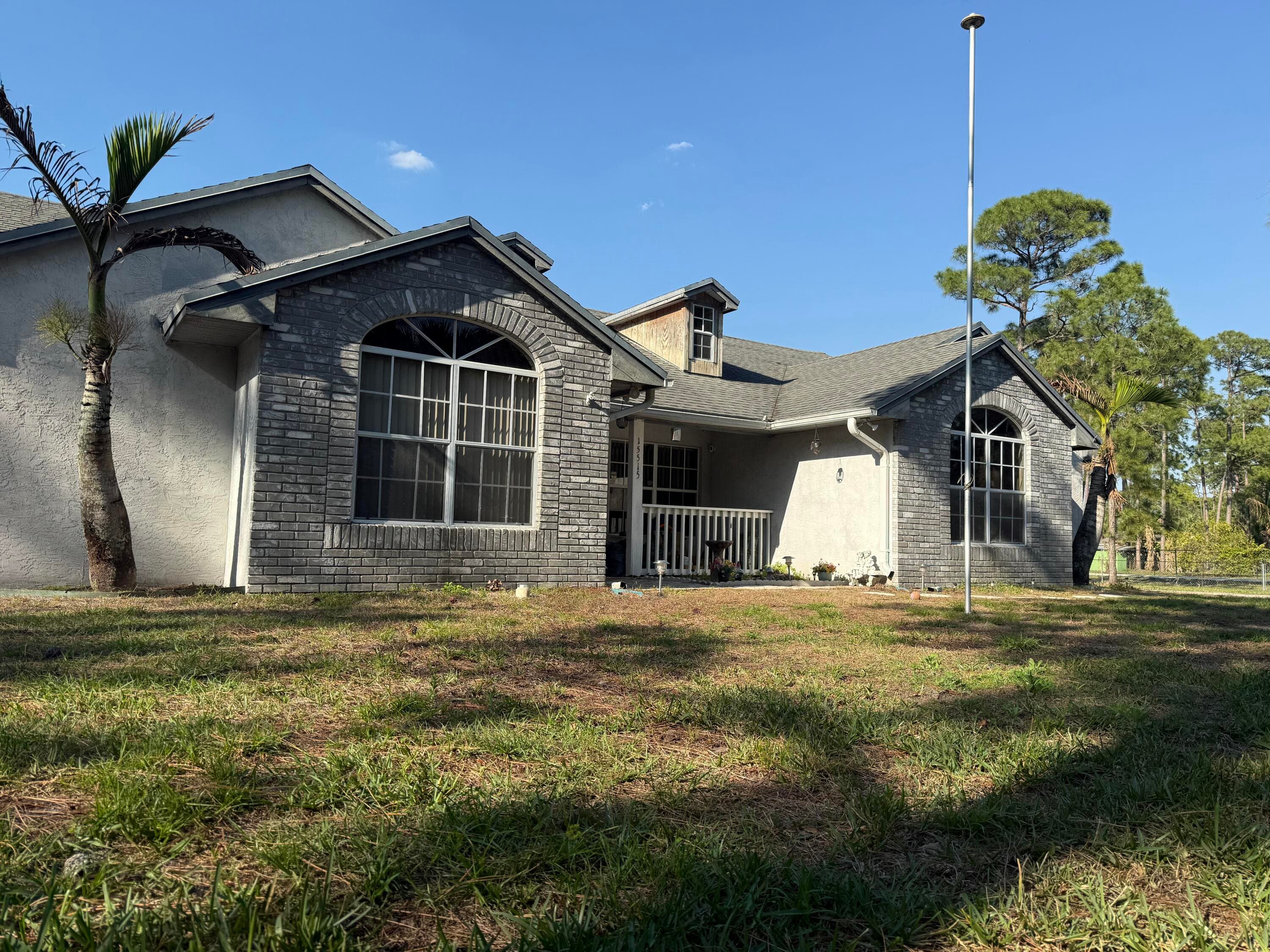 15515 N 94th St Street N, The Acreage, FL 33412 — photo 1 of 61