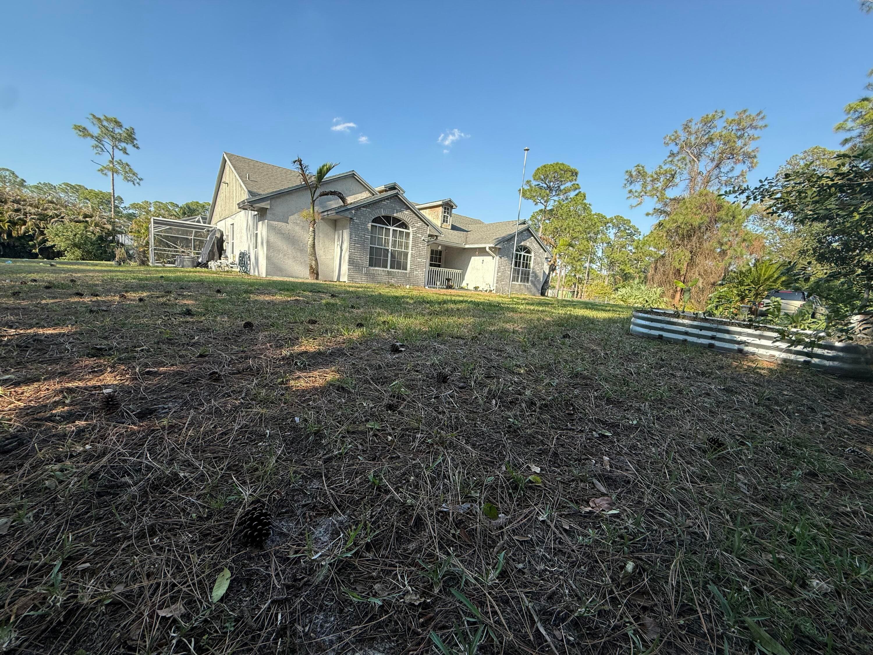 15515 N 94th St Street N, The Acreage, FL 33412 — photo 7 of 61