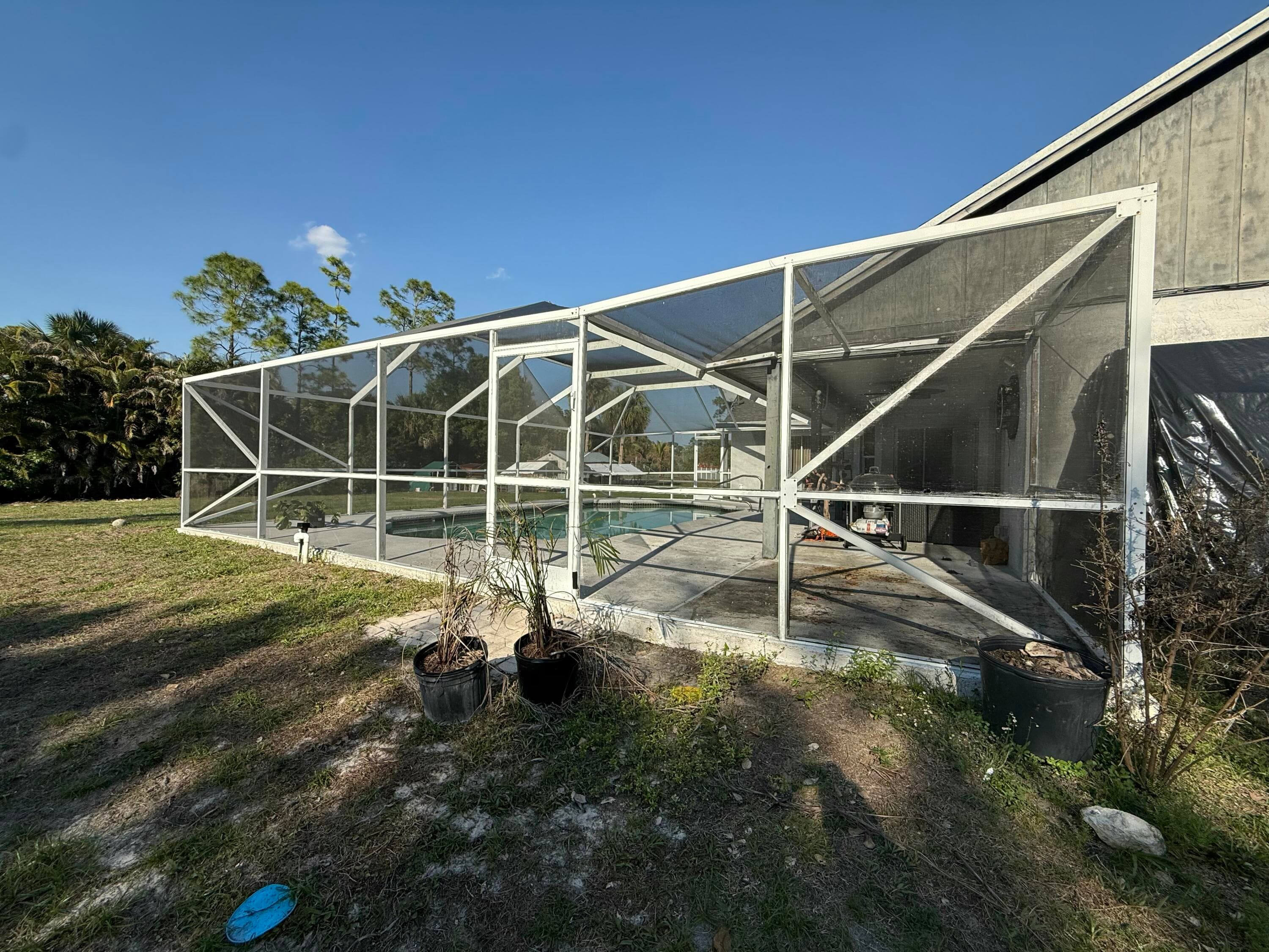 15515 N 94th St Street N, The Acreage, FL 33412 — photo 10 of 61