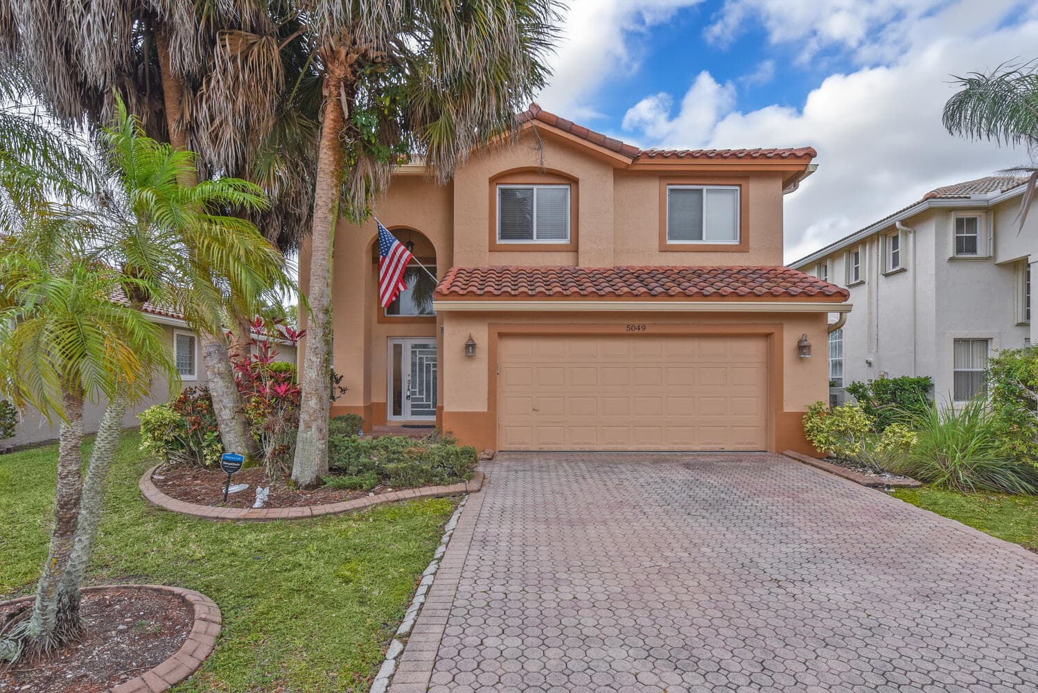 5049 NW 121st Drive, Coral Springs, FL 33076 — photo 1 of 44