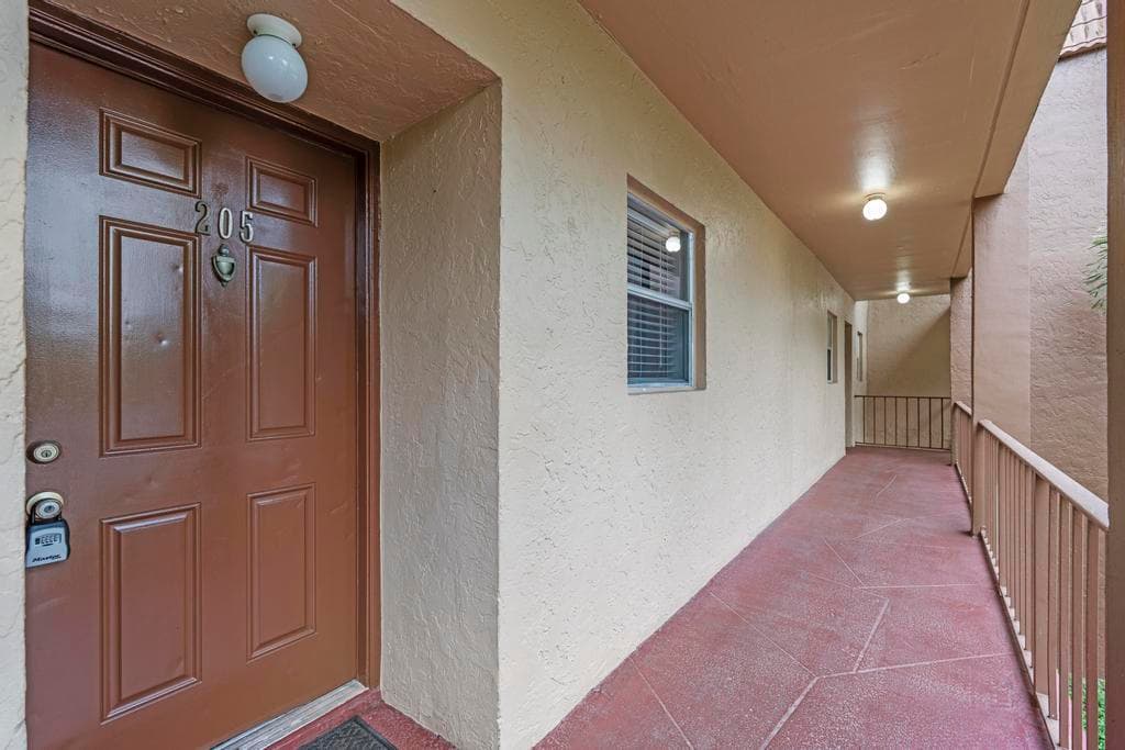 120 Sparrow Drive 205, Royal Palm Beach, FL 33411 — photo 1 of 27