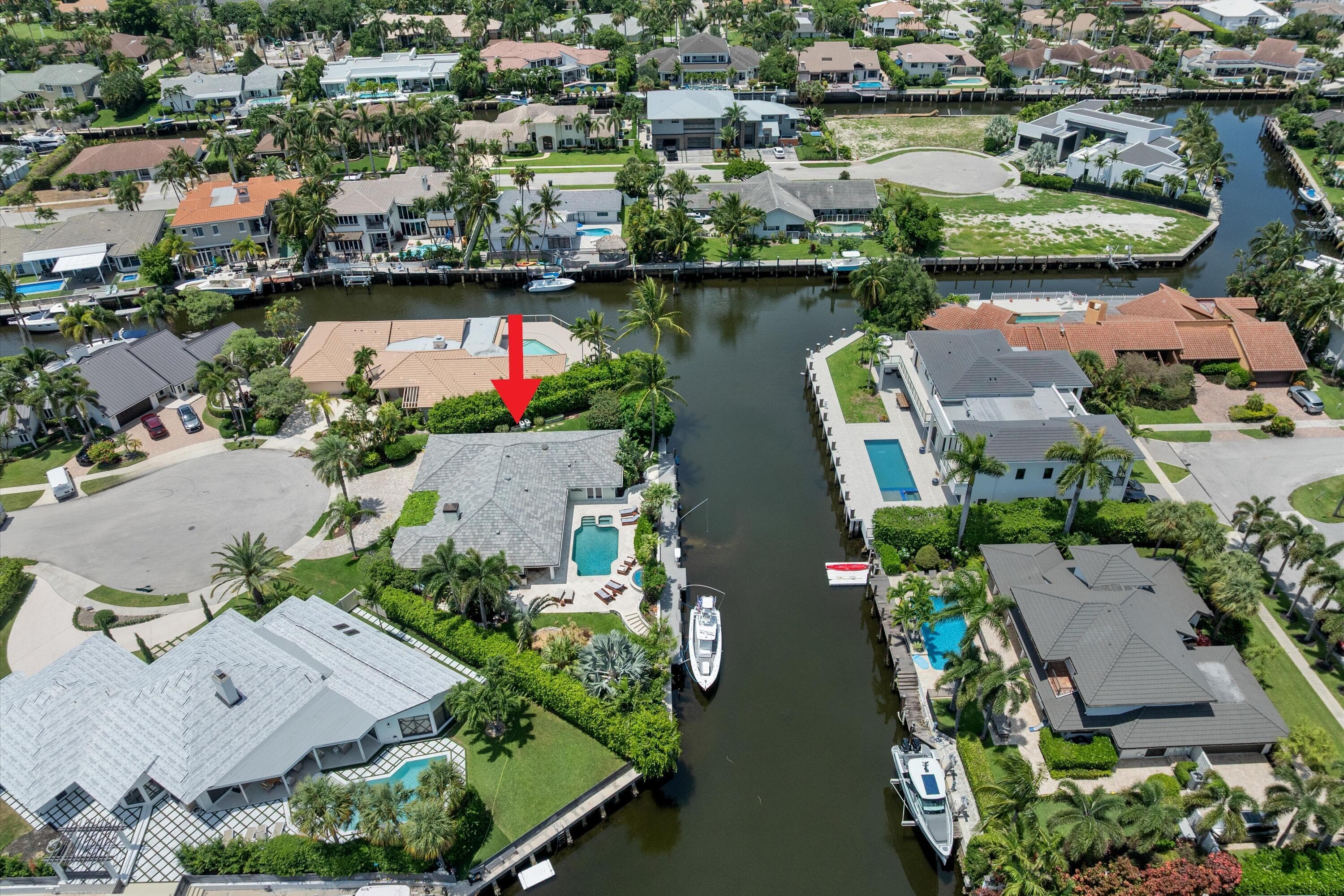 830 NE Boca Bay Colony Drive, Boca Raton, FL 33487 — photo 40 of 49