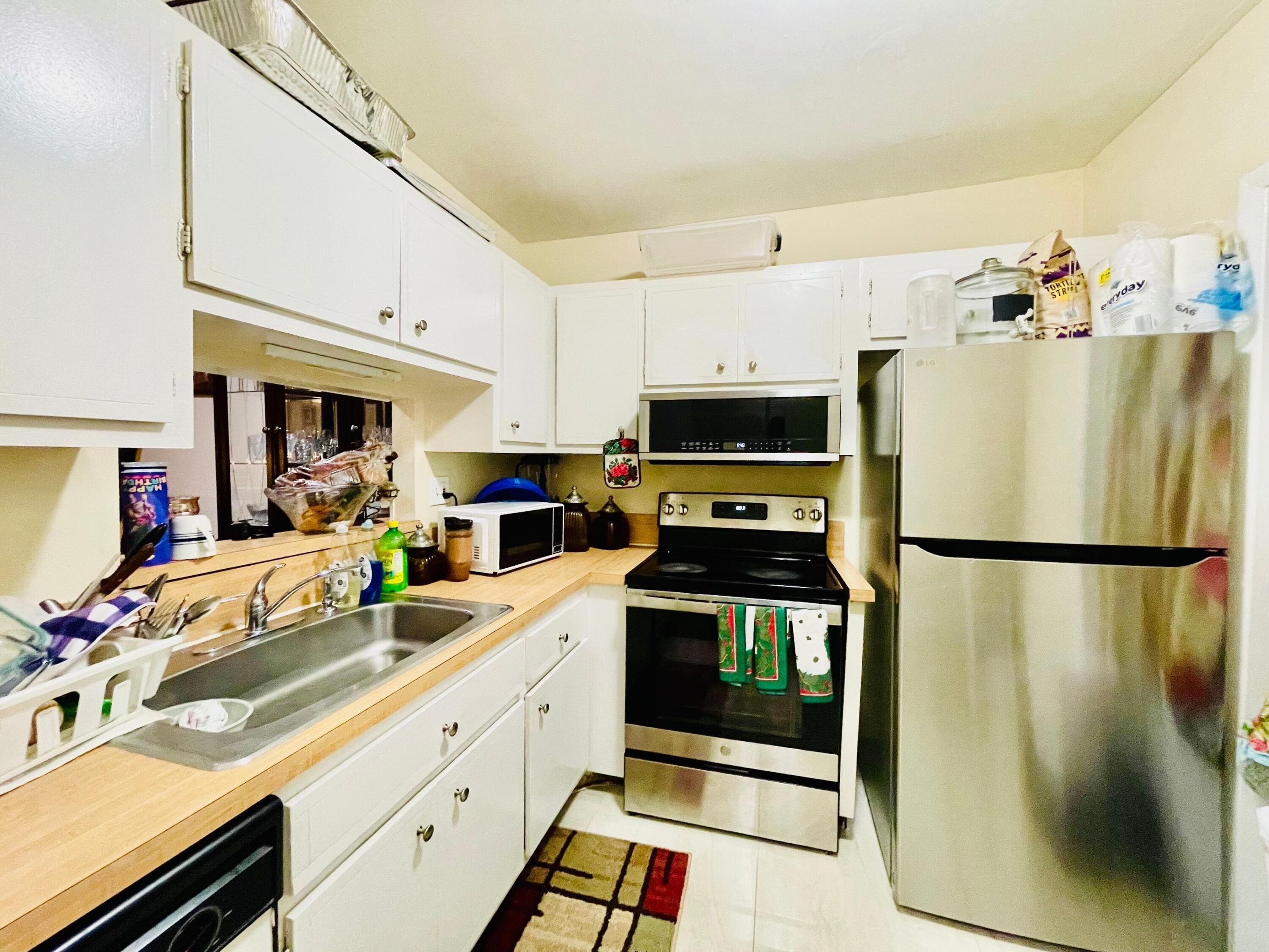 5051 W Oakland Park Boulevard W Unit E212, Lauderdale Lakes, FL 33313 — photo 3 of 23