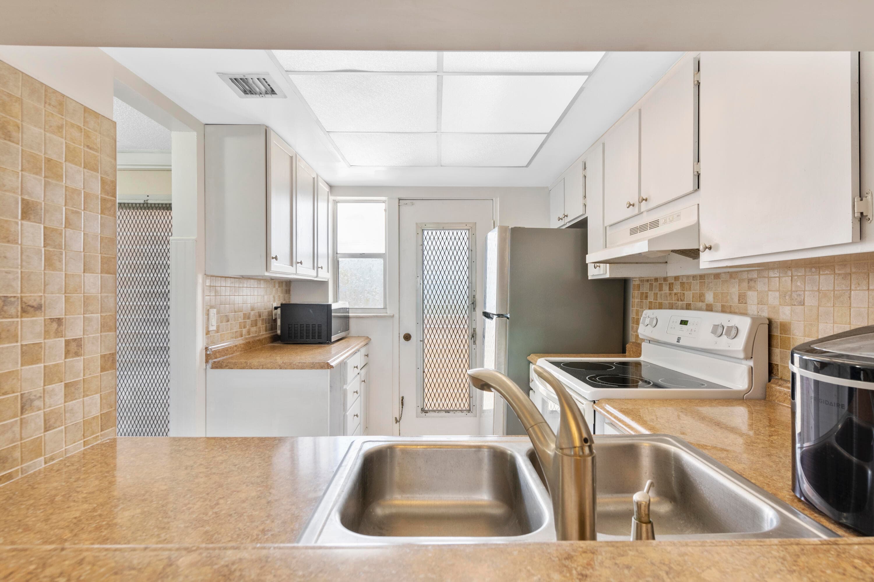 1101 Crystal Lake Drive 309, Deerfield Beach, FL 33064 — photo 3 of 23