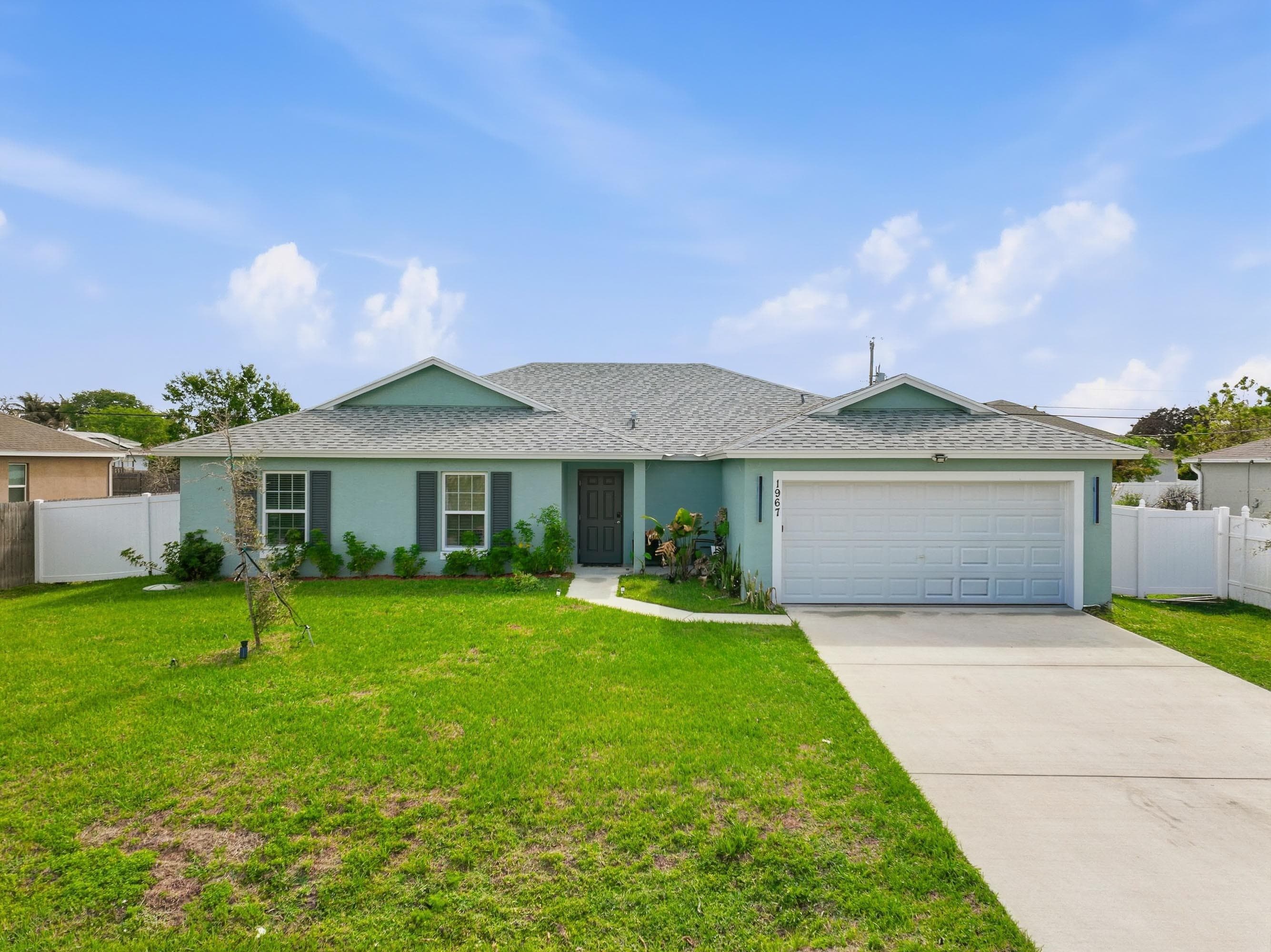 1967 SW Beard Street, Port St. Lucie, FL 34953 — photo 1 of 40