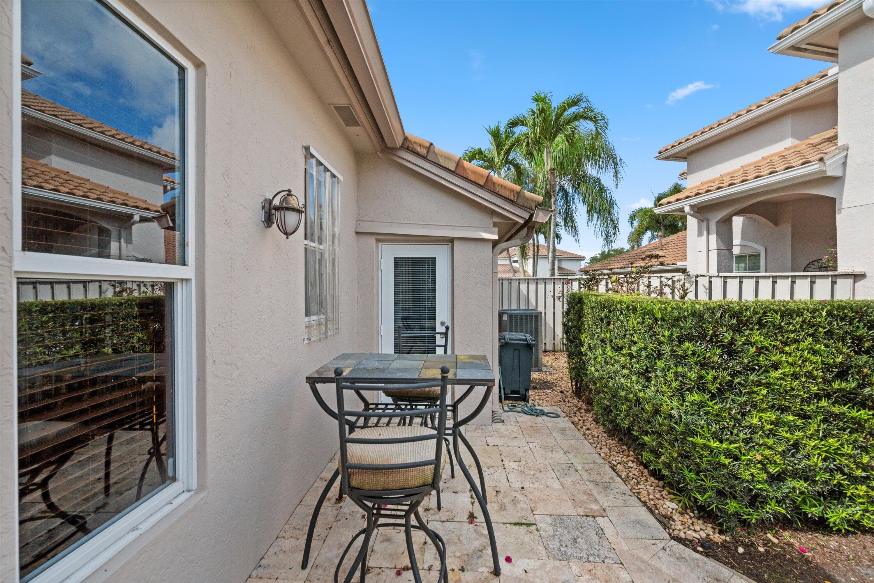 923 Augusta Pointe Drive, Palm Beach Gardens, FL 33418 — photo 32 of 44
