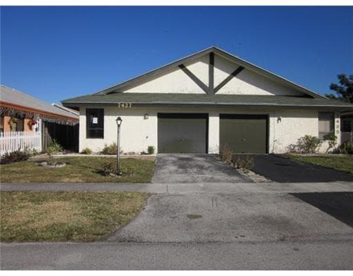 7427 SW 13th Street, North Lauderdale, FL 33068 — photo 1 of 49
