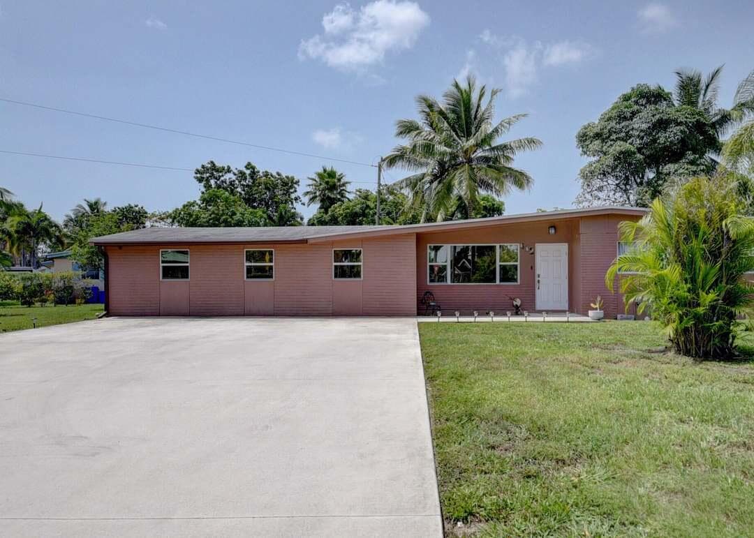 612 Hibiscus Drive, Royal Palm Beach, FL 33411 — photo 1 of 20