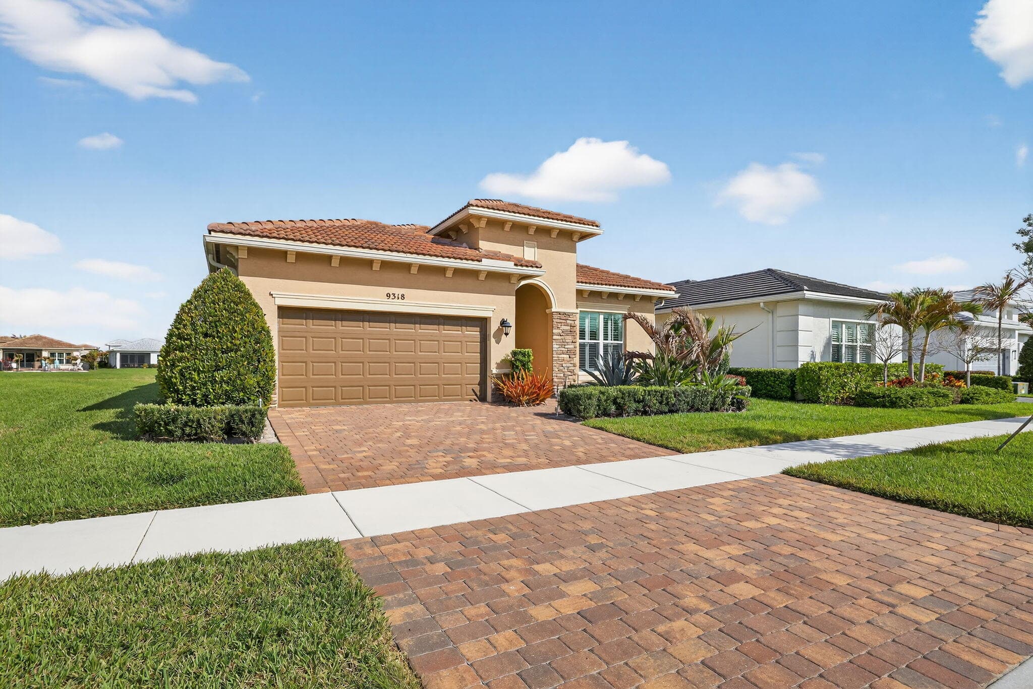 9318 SW Miracoli Way, Port St. Lucie, FL 34987 — photo 1 of 83