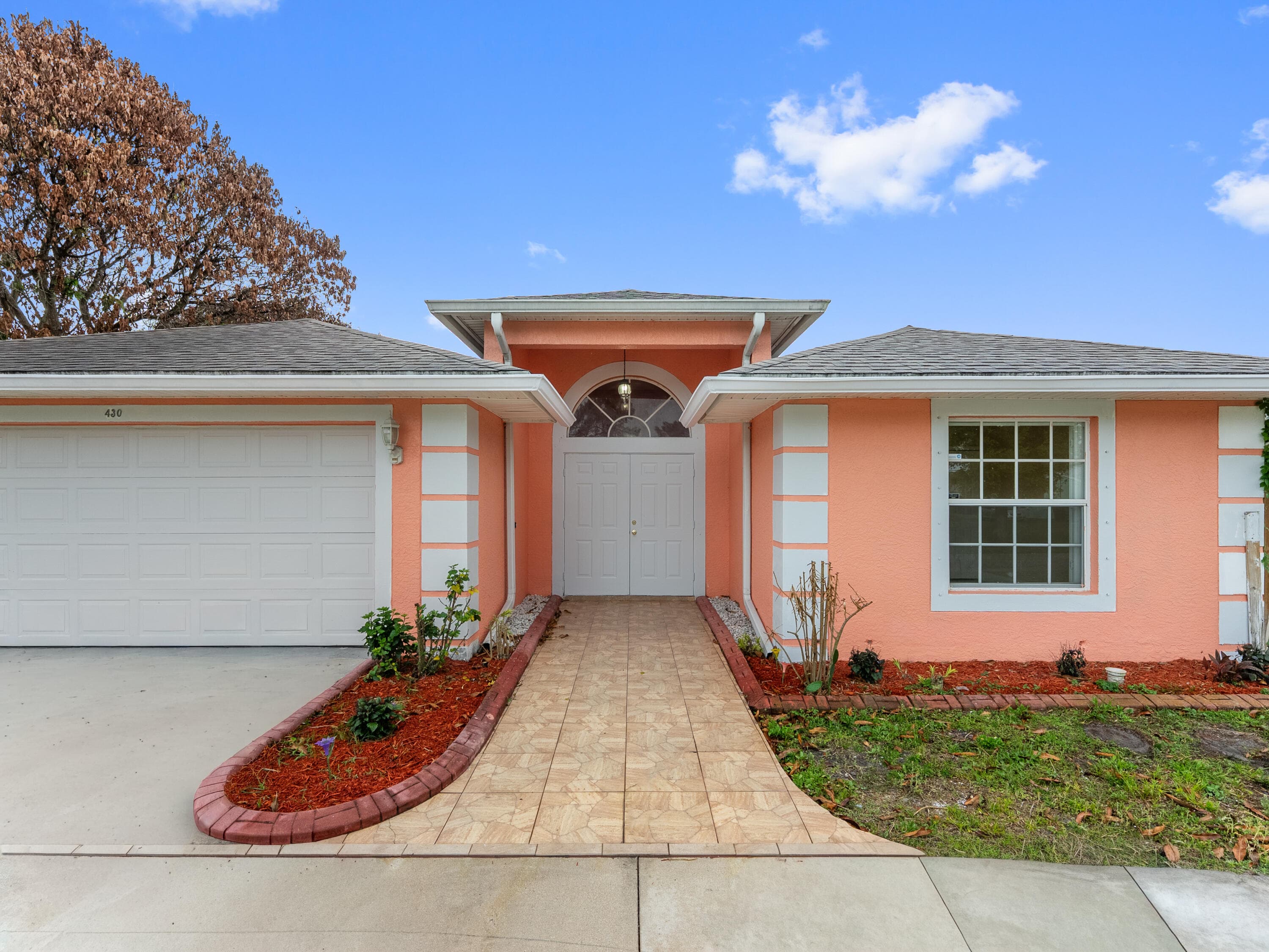 430 SE Thanksgiving Avenue, Port St. Lucie, FL 34984 — photo 2 of 38