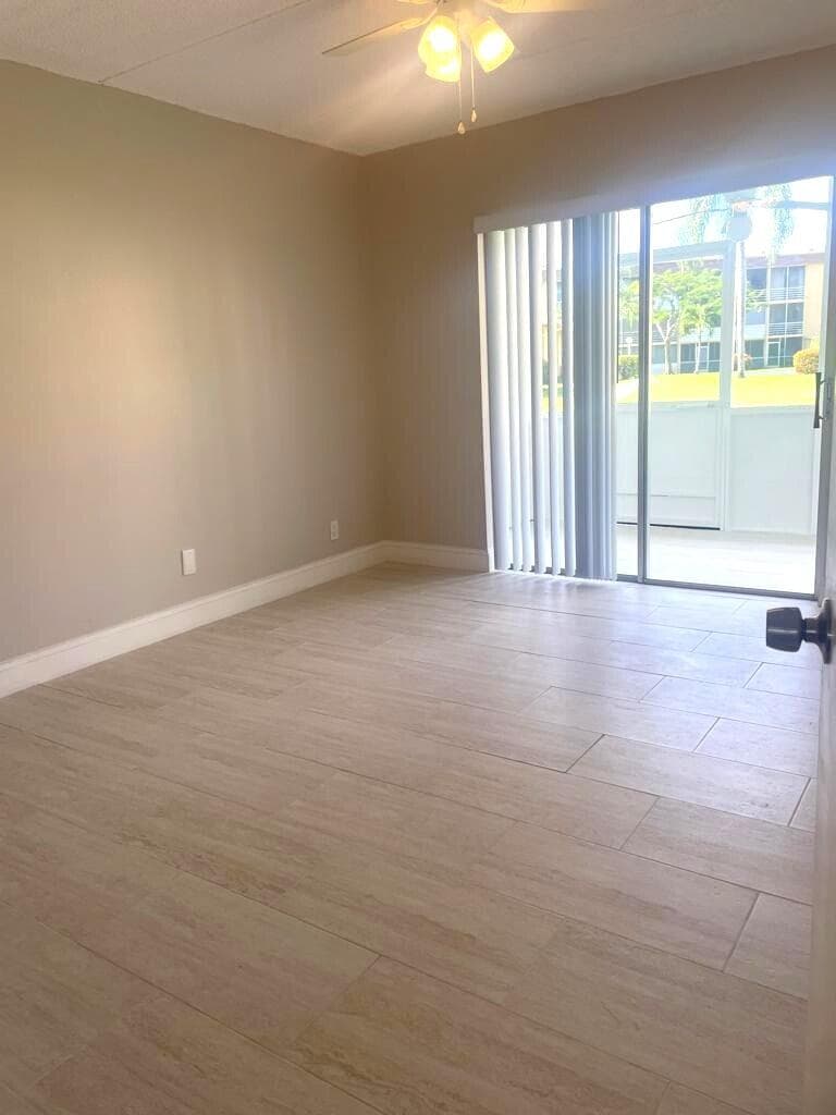 100 Village Green Circle E 112, Palm Springs, FL 33461 — photo 9 of 19