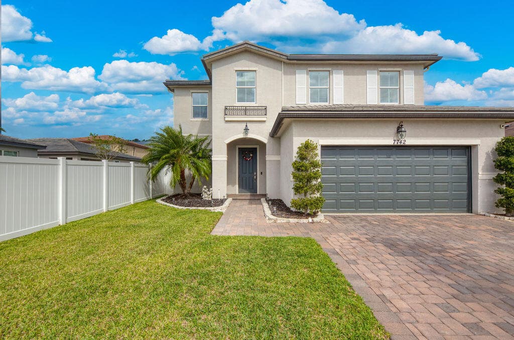 7742 NW Gladwell Lane, Port St. Lucie, FL 34987 — photo 1 of 69
