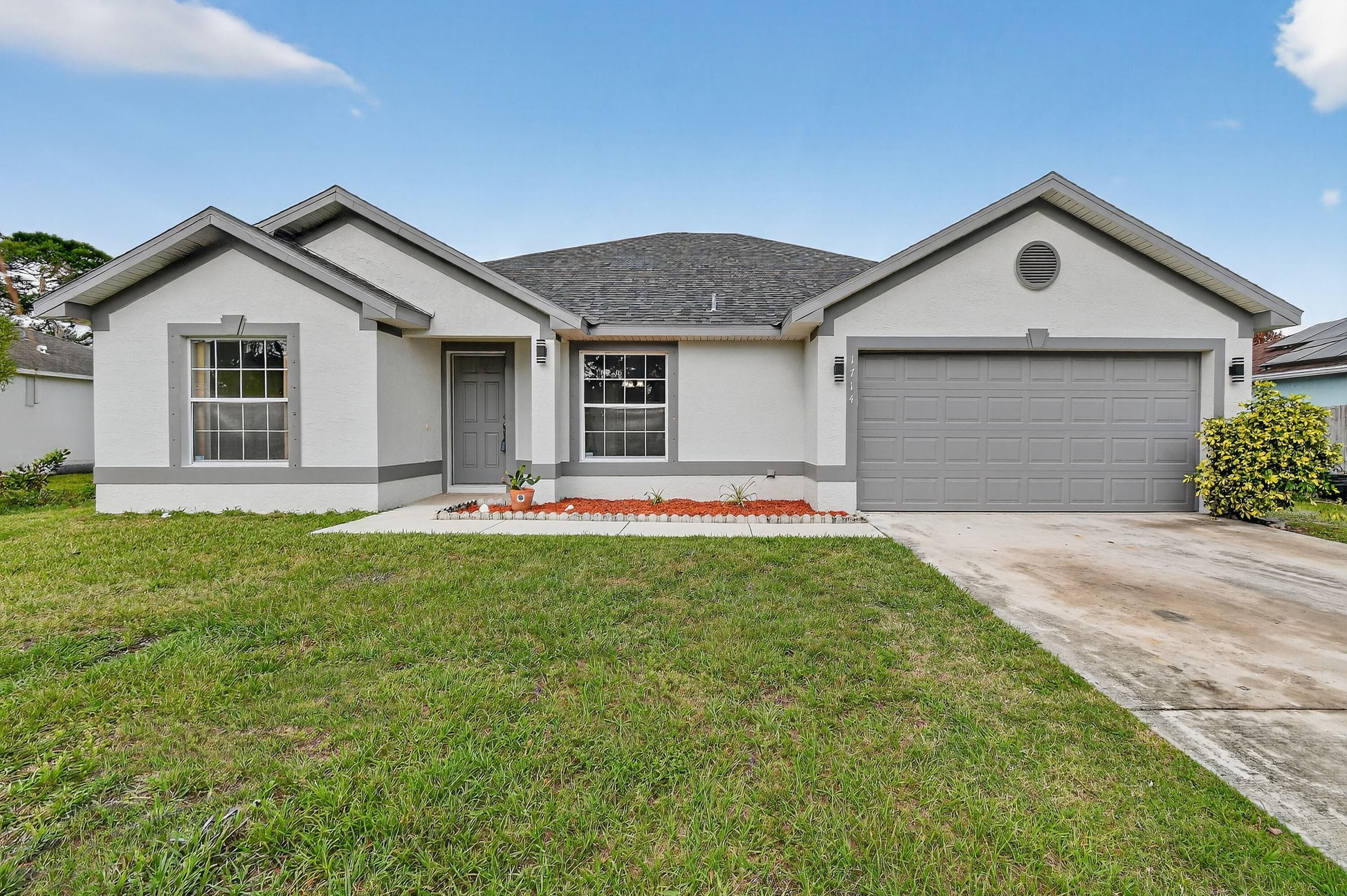 1714 SE Aneci Street, Port St. Lucie, FL 34983 — photo 1 of 46
