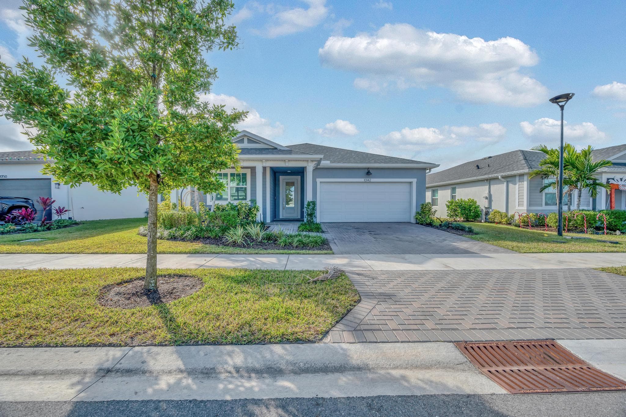 10142 SW Orana Drive, Port St. Lucie, FL 34987 — photo 1 of 49