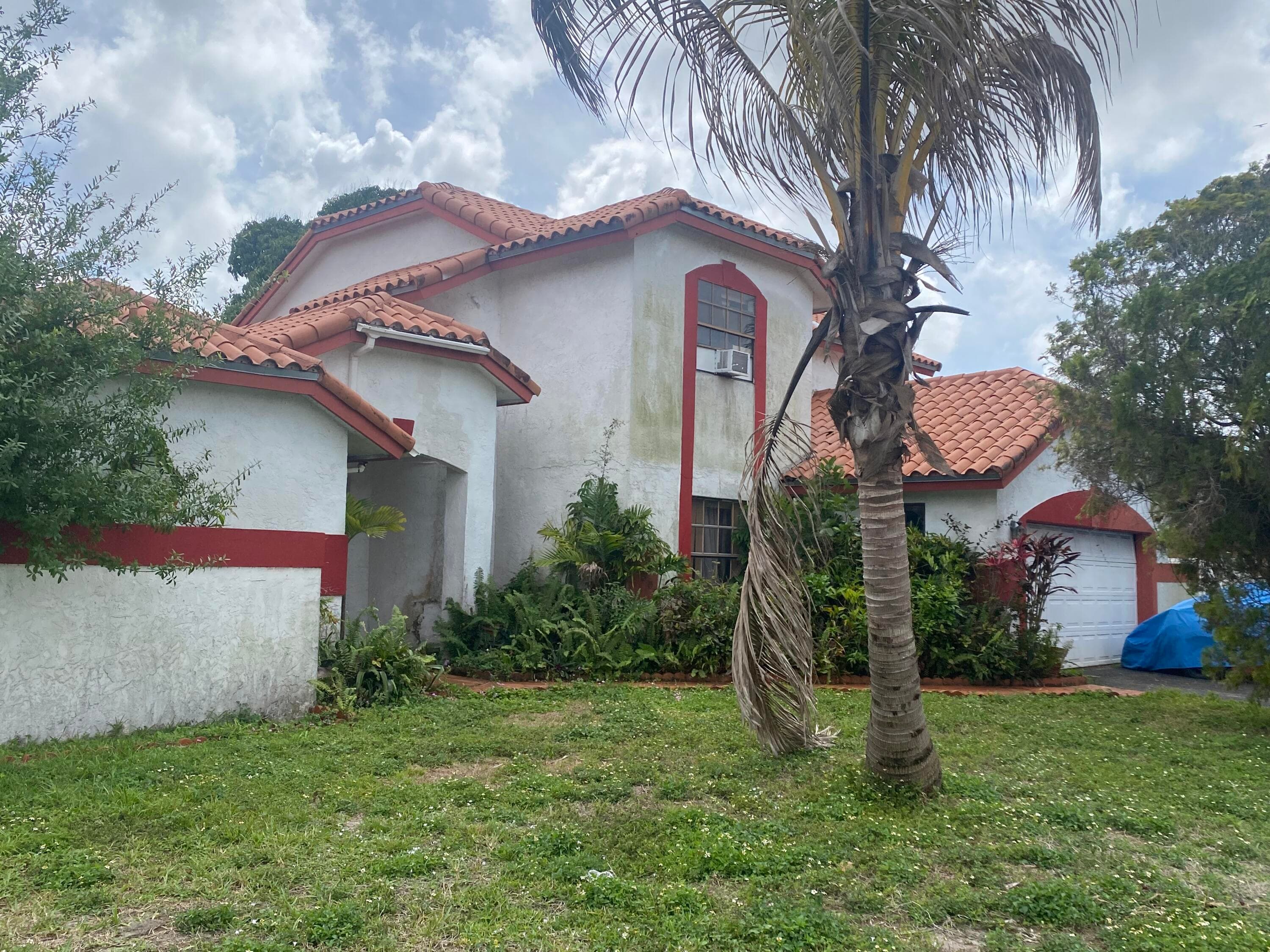 7350 NW 54th Court, Lauderhill, FL 33319 — photo 1 of 40