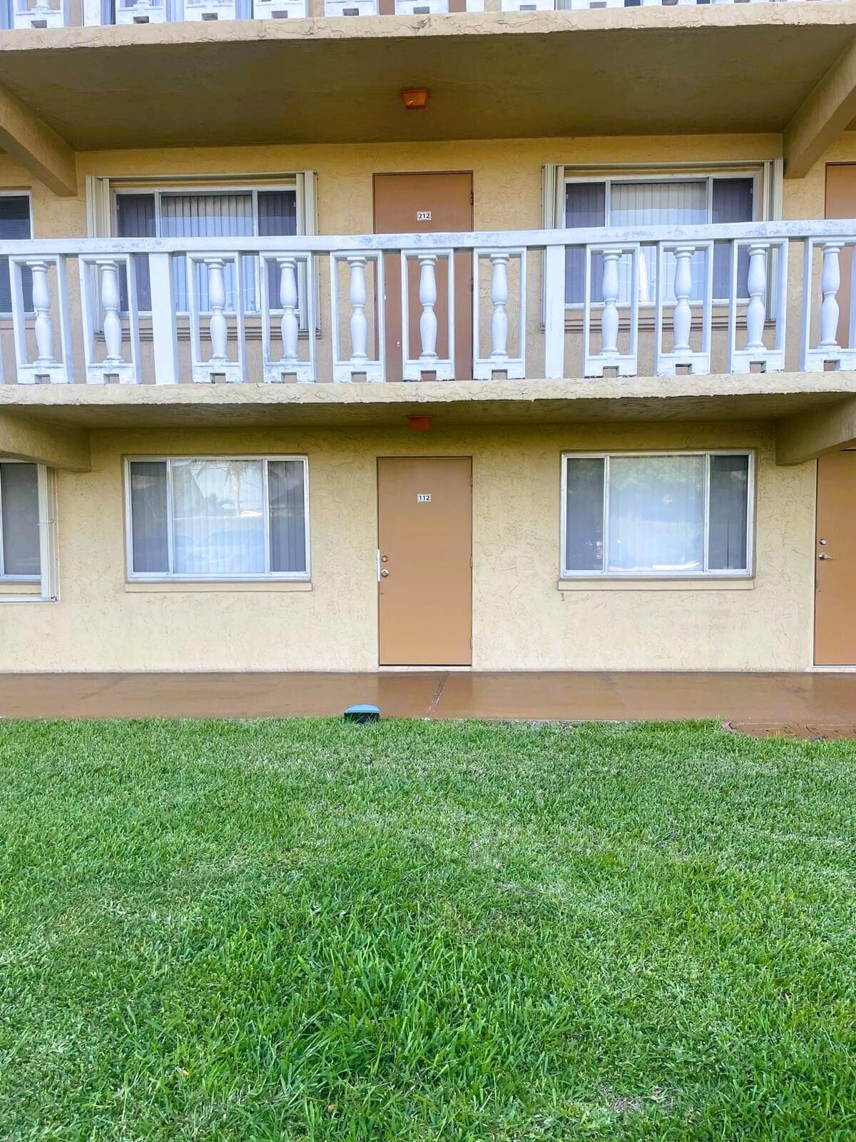 100 Village Green Circle E 112, Palm Springs, FL 33461 — photo 1 of 19