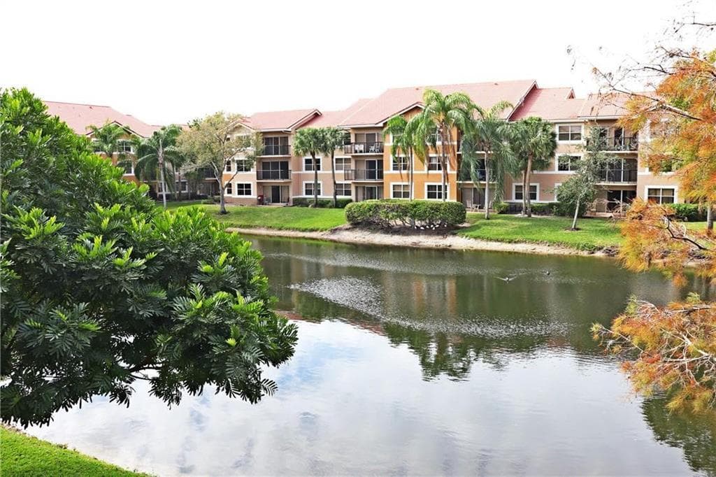 8891 Wiles Road 303, Coral Springs, FL 33067 — photo 1 of 10
