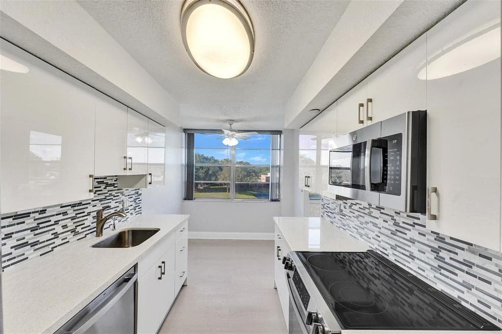 1000 Saint Charles Place 305, Pembroke Pines, FL 33026 — photo 2 of 34