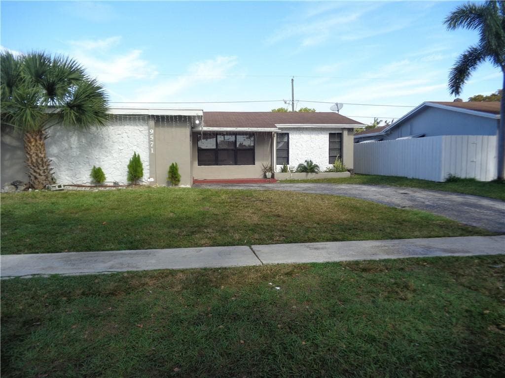 9571 Sunset Strip, Sunrise, FL 33322 — photo 1 of 16