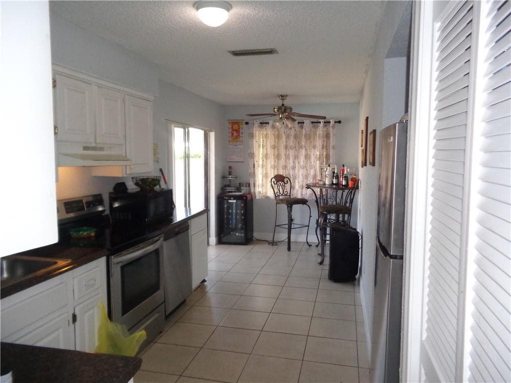 9571 Sunset Strip, Sunrise, FL 33322 — photo 5 of 16