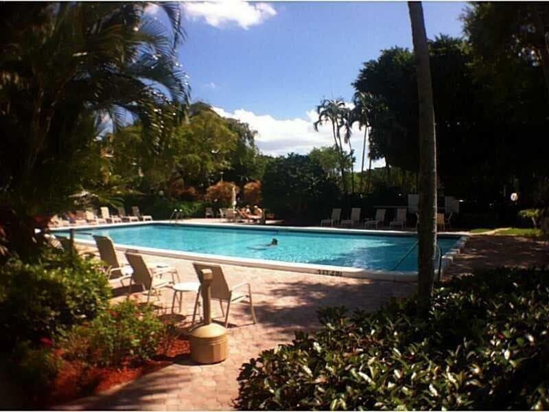 3091 N Course Drive 303, Pompano Beach, FL 33069 — photo 2 of 25