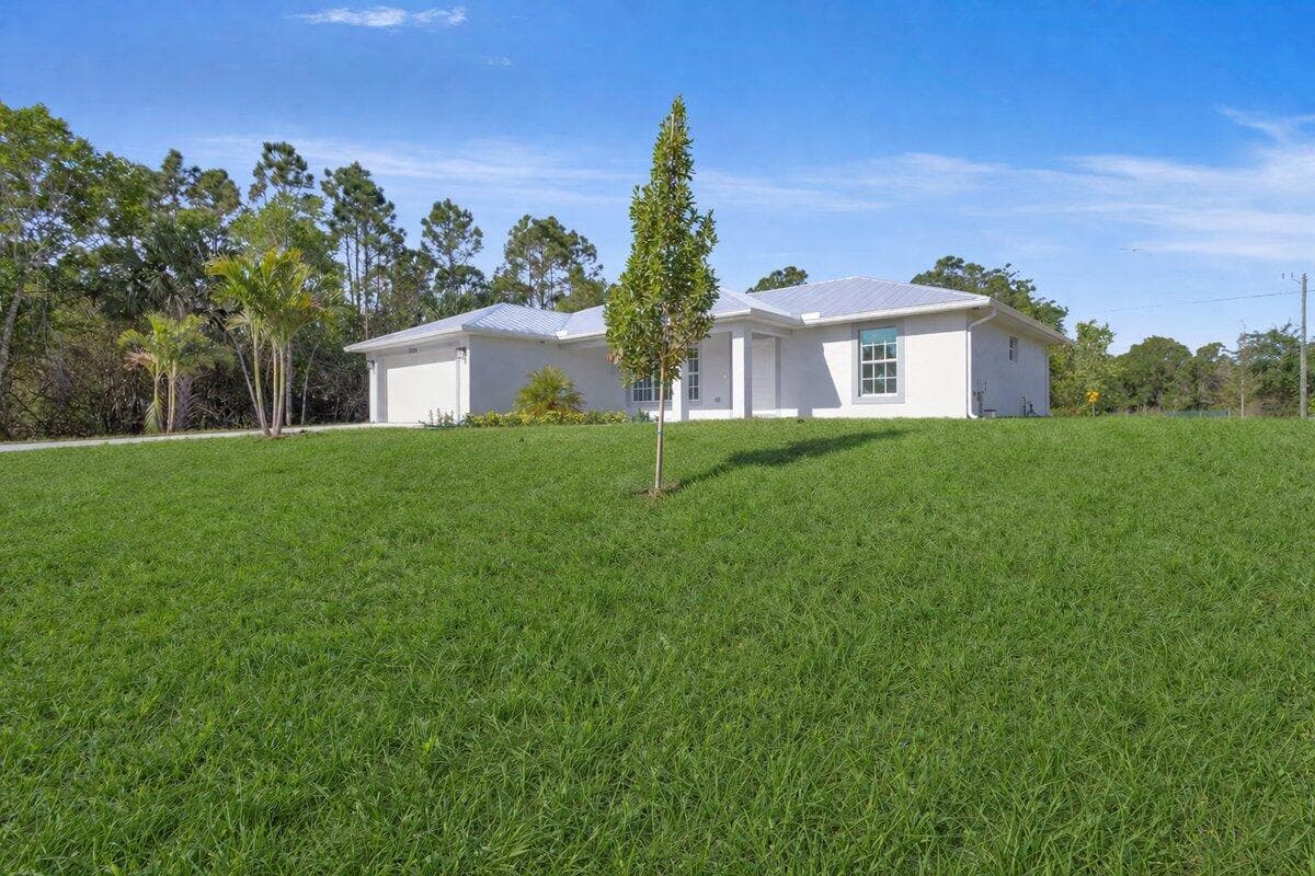 3393 NW 38th Avenue, Okeechobee, FL 34972 — photo 1 of 42