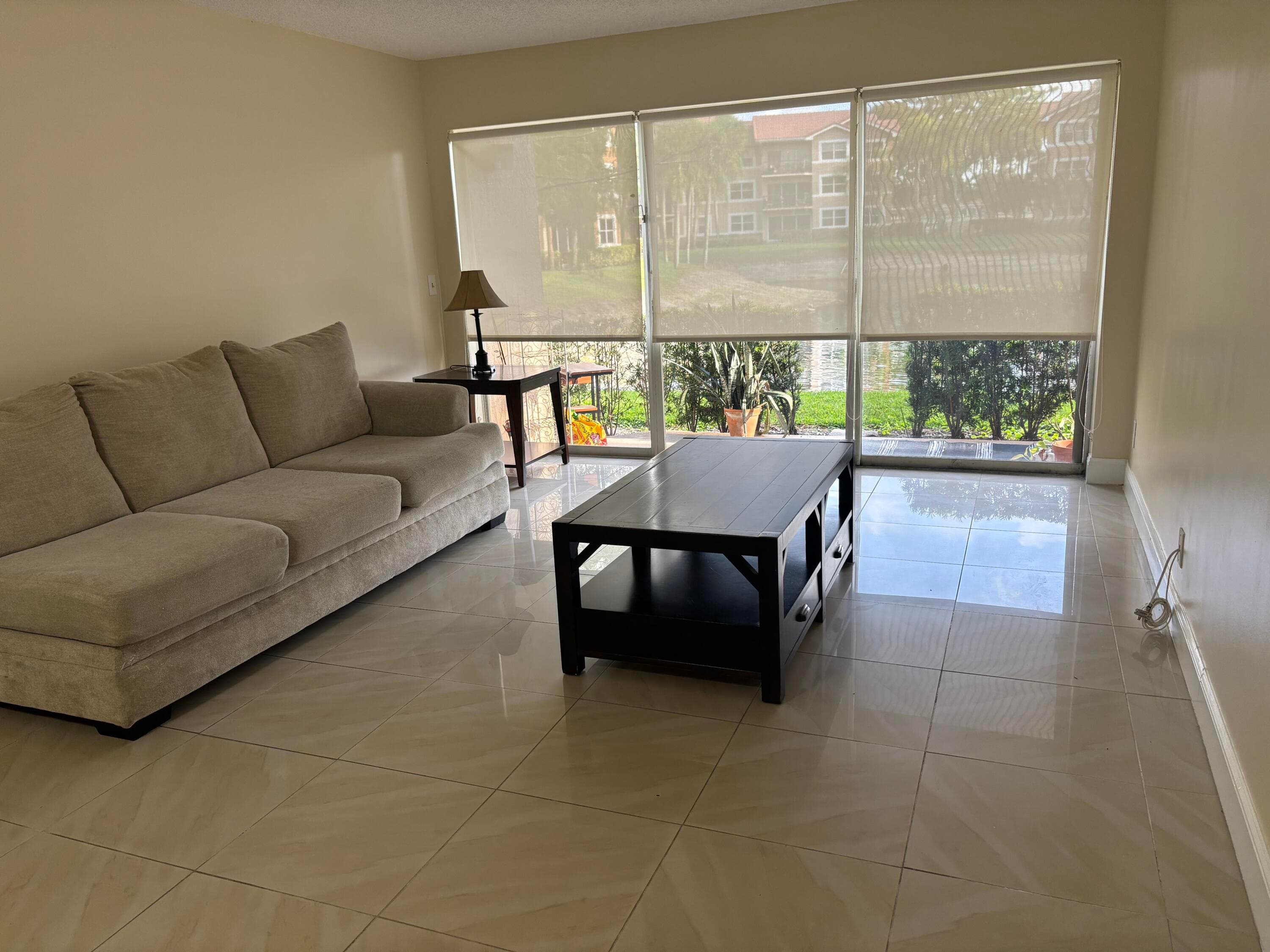9033 Wiles Road 102, Coral Springs, FL 33067 — photo 2 of 17