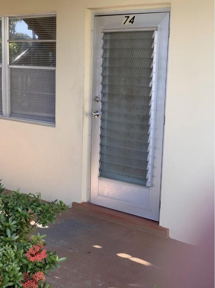 74 Sheffield D, West Palm Beach, FL 33417 — photo 1 of 11