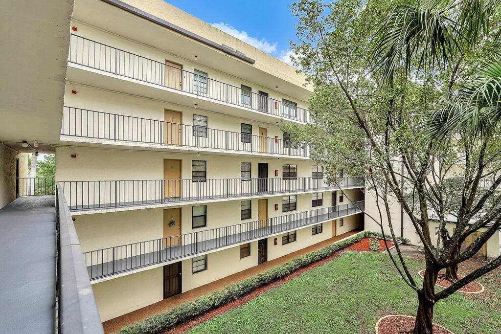 6190 Woodlands Boulevard 311, Tamarac, FL 33319 — photo 3 of 35