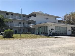 1150 E Sample Road 306, Pompano Beach, FL 33064 — photo 1 of 9