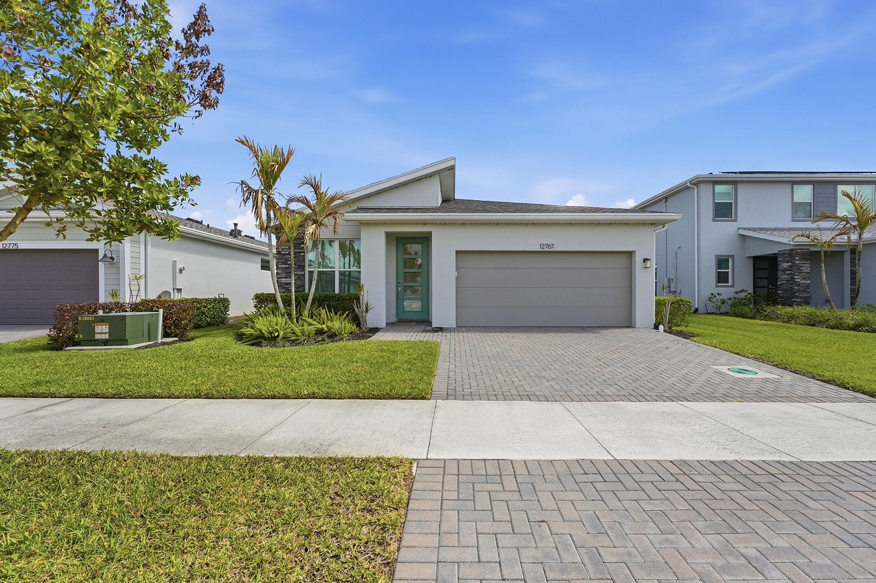 12767 SW Phoenix Drive, Port St. Lucie, FL 34987 — photo 1 of 49
