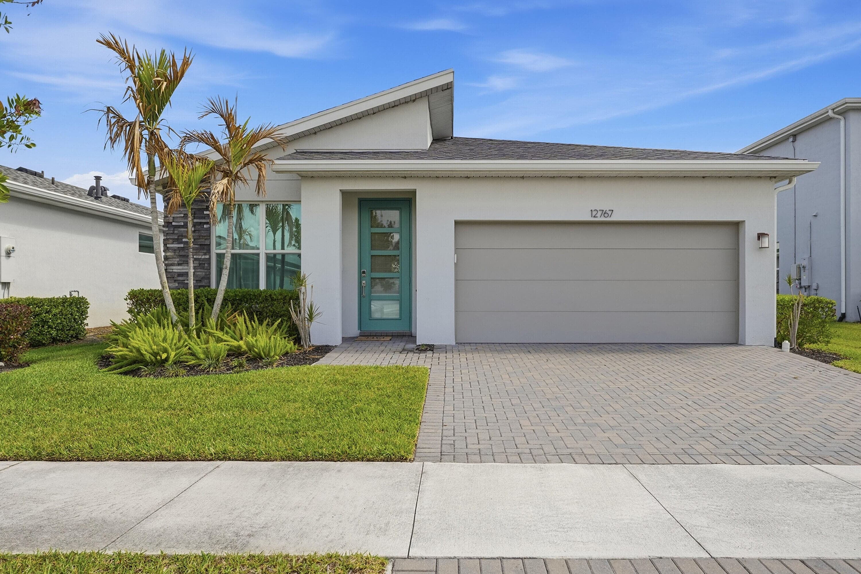 12767 SW Phoenix Drive, Port St. Lucie, FL 34987 — photo 2 of 49