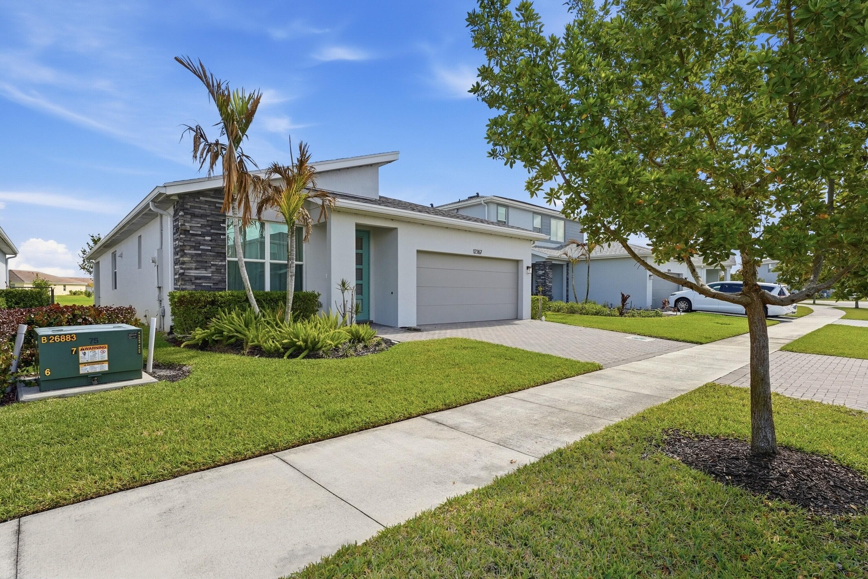 12767 SW Phoenix Drive, Port St. Lucie, FL 34987 — photo 4 of 49