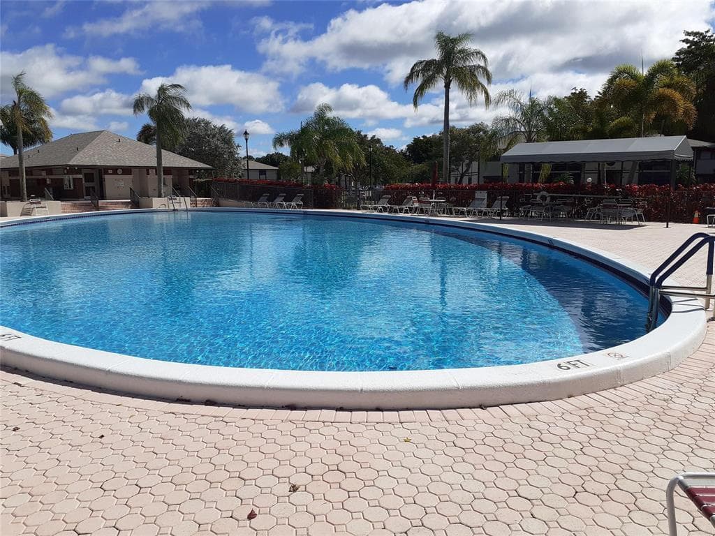 9425 S Belfort Circle 104, Tamarac, FL 33321 — photo 14 of 15