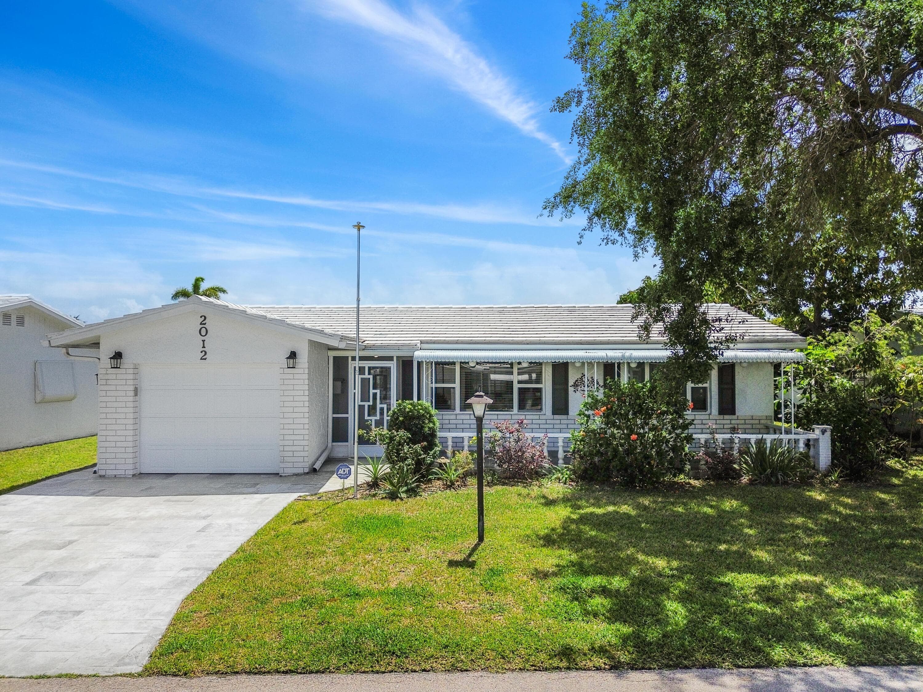 2012 SW 17th Avenue, Boynton Beach, FL 33426 — photo 1 of 26