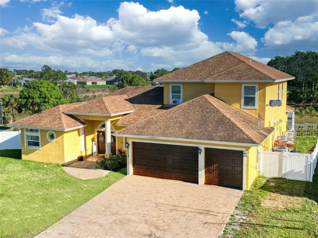 6112 NW Ginger Lane, Port St. Lucie, FL 34986 — photo 1 of 40