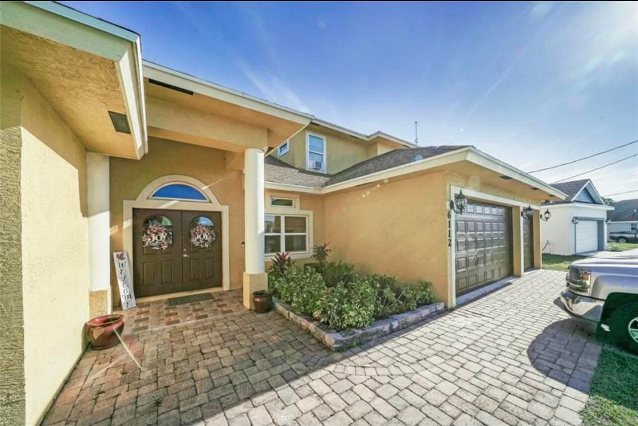 6112 NW Ginger Lane, Port St. Lucie, FL 34986 — photo 3 of 40