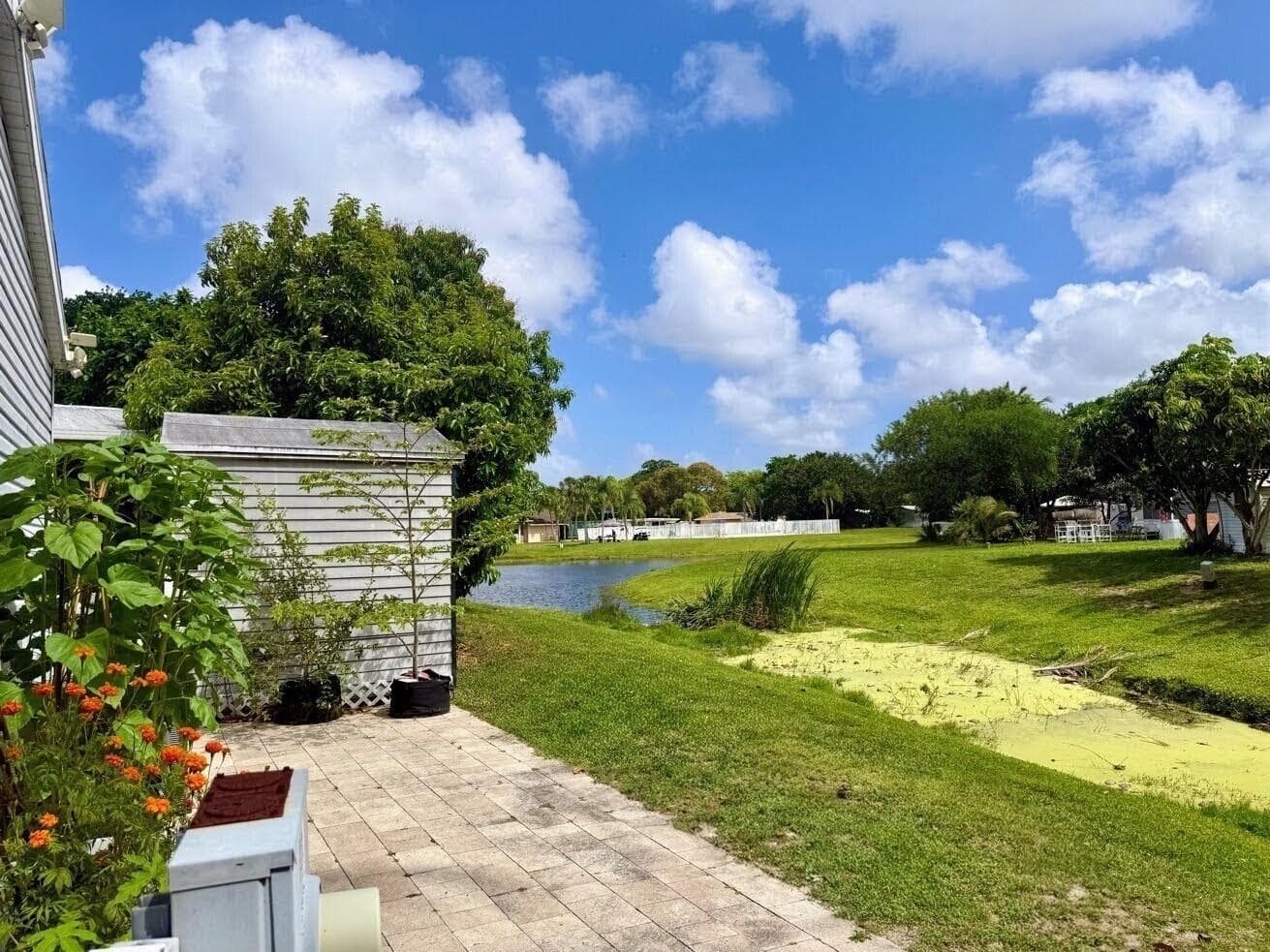 135 Parkside Court, Coconut Creek, FL 33073 — photo 1 of 24