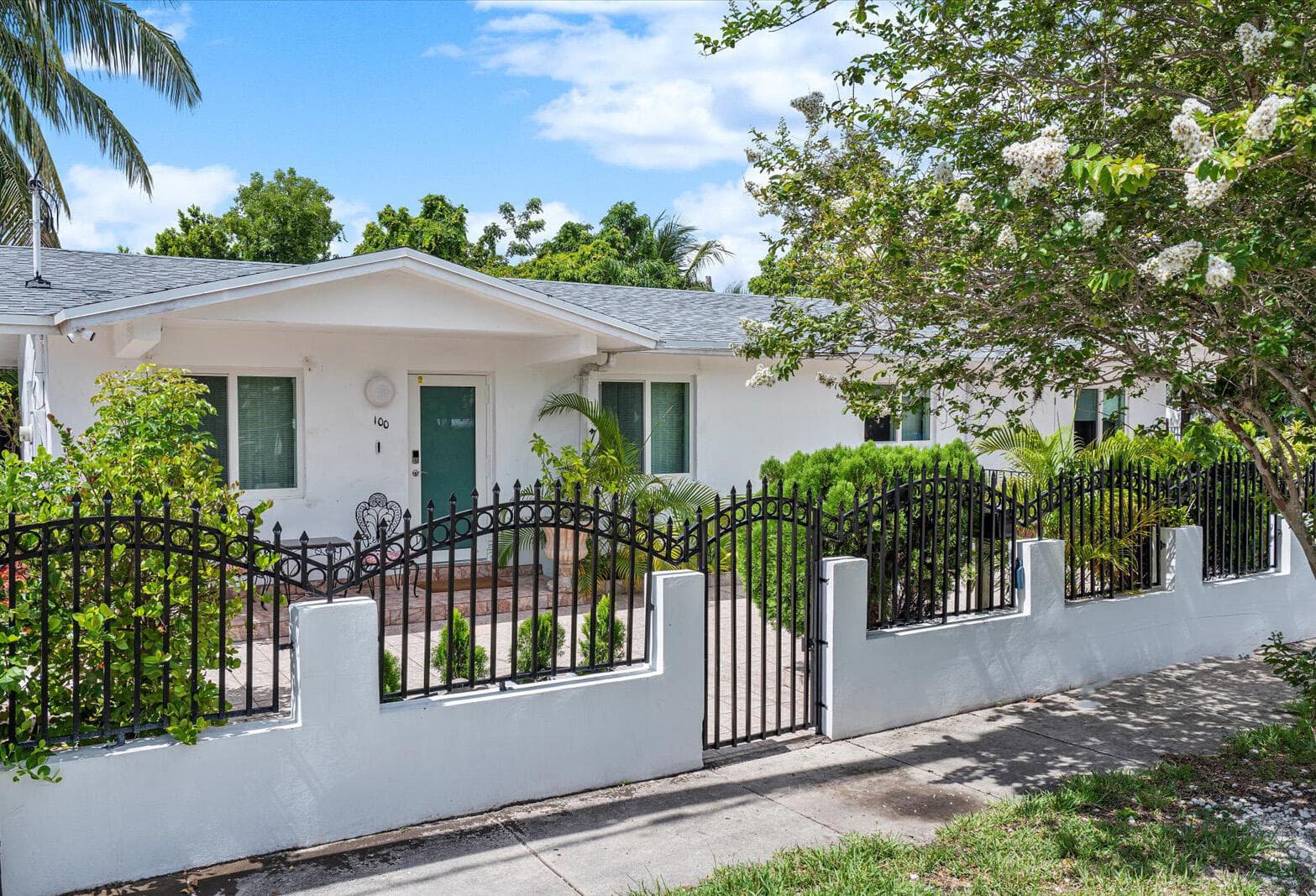 100 NW 40th Street, Miami, FL 33127 — photo 1 of 16