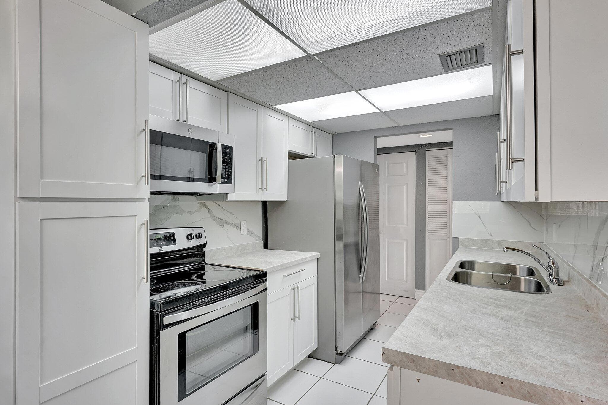 6190 Woodlands Boulevard 311, Tamarac, FL 33319 — photo 14 of 35