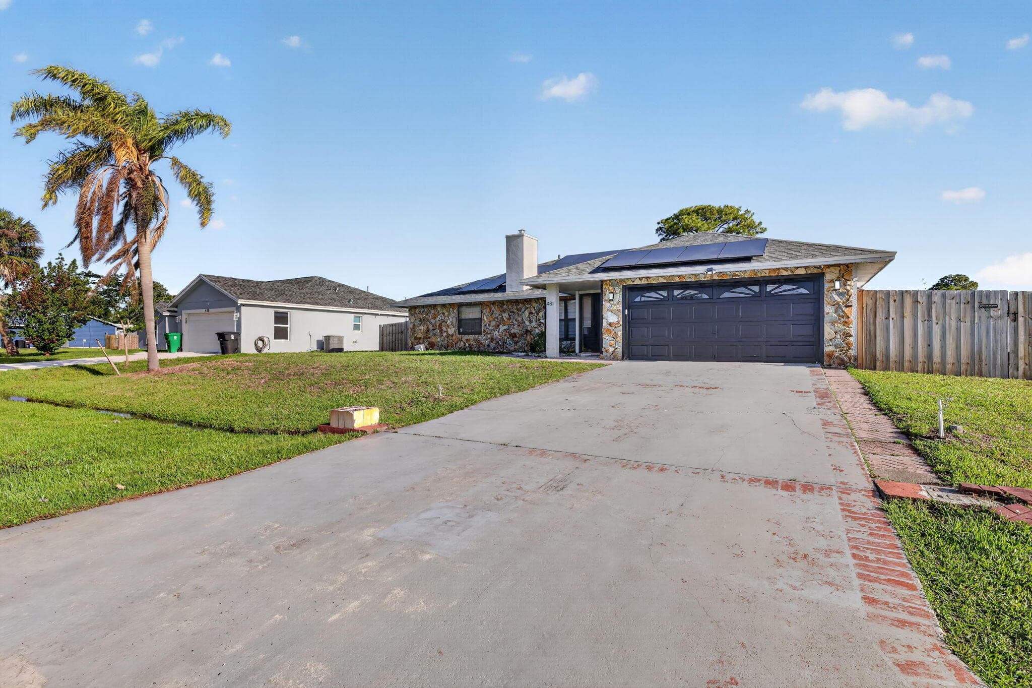 481 SW Aster Road, Port St. Lucie, FL 34953 — photo 1 of 58
